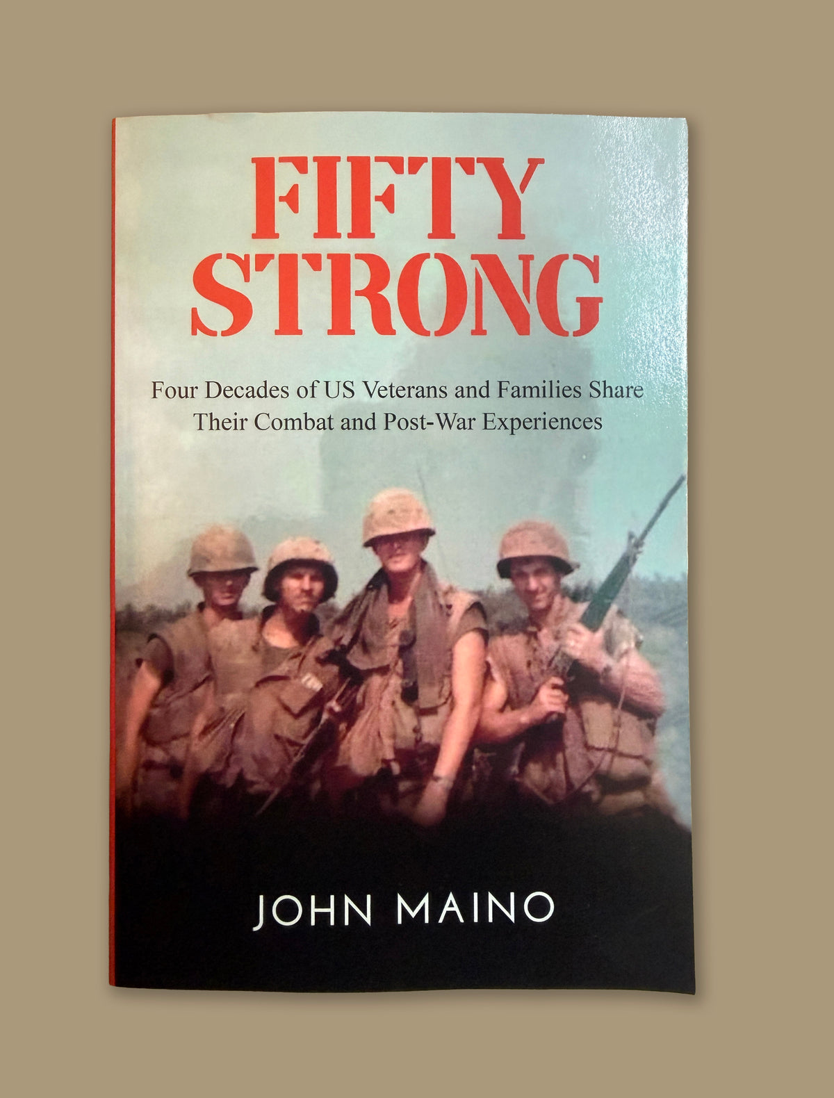 Fifty Strong: WWII, Korea & Vietnam Veterans' Stories by John Maino